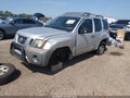 2015 Nissan Xterra — photo 2 of 16 | VIN 5N1AN0NU5FN659703