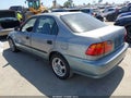 1999 Honda Civic — photo 3 of 15 | VIN 2HGEJ6675XH549386