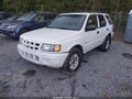 2002 Isuzu Rodeo — photo 2 of 12 | VIN 4S2CK58W924324853