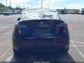 2024 Tesla Model Y — photo 16 of 22 | VIN 7SAYGDED4RA303184