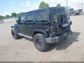 2011 Jeep Wrangler Unlimited — photo 3 of 11 | VIN 1J4HA5H1XBL538212