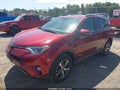 2018 Toyota RAV4 — photo 2 of 16 | VIN 2T3RFREV7JW807918