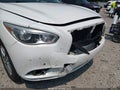 2013 Infiniti JX35 — photo 18 of 19 | VIN 5N1AL0MN9DC334433