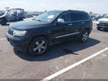2013 Jeep Grand Cherokee — photo 2 of 16 | VIN 1C4RJFBG4DC510955