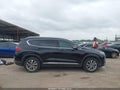 2019 Hyundai Santa Fe — photo 13 of 16 | VIN 5NMS53AD6KH103777