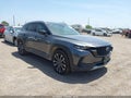 2025 Mazda CX-50 — photo 1 of 17 | VIN 7MMVADAY2SN372993