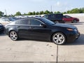 2014 Acura TL — photo 13 of 16 | VIN 19UUA9F70EA001496
