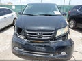 2016 Honda Odyssey — photo 13 of 17 | VIN 5FNRL5H90GB074707