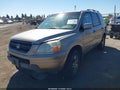 2004 Honda Pilot — photo 2 of 16 | VIN 2HKYF18614H572929
