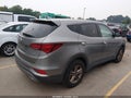 2017 Hyundai Santa Fe — photo 4 of 16 | VIN 5NMZTDLB4HH012957