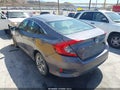 2018 Honda Civic — photo 3 of 21 | VIN 19XFC2F50JE008625