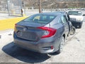2018 Honda Civic — photo 4 of 21 | VIN 19XFC2F50JE008625