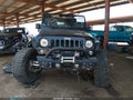 2018 Jeep Wrangler Unlimited — photo 13 of 17 | VIN 1C4BJWFG9JL806495