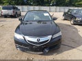 2015 Acura TLX — photo 12 of 16 | VIN 19UUB3F52FA009657