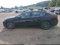 2015 Acura TLX — photo 14 of 16 | VIN 19UUB3F52FA009657