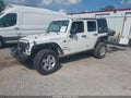 2013 Jeep Wrangler Unlimited — photo 2 of 17 | VIN 1C4BJWDG6DL659091