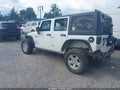 2013 Jeep Wrangler Unlimited — photo 3 of 17 | VIN 1C4BJWDG6DL659091