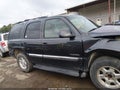 2006 GMC Yukon — photo 14 of 17 | VIN 1GKEK13Z06J105550