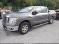 2017 Nissan Titan — photo 2 of 17 | VIN 1N6AA1E69HN514154