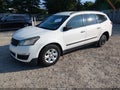 2015 Chevrolet Traverse — photo 2 of 16 | VIN 1GNKRFKD8FJ210843