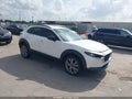 2023 Mazda CX-30 — photo 1 of 18 | VIN 3MVDMBBM1PM558639