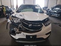 2020 Buick Encore — photo 13 of 17 | VIN KL4CJASB0LB000436