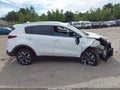 2021 Kia Sportage — photo 14 of 17 | VIN KNDPNCAC9M7871471