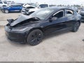 2024 Tesla Model 3 — photo 2 of 14 | VIN 5YJ3E1EA8RF729724