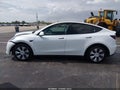 2021 Tesla Model Y — photo 12 of 14 | VIN 5YJYGDEE5MF069476