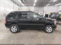 2009 Kia Sportage — photo 14 of 17 | VIN KNDJF724697555793