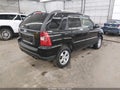 2009 Kia Sportage — photo 4 of 17 | VIN KNDJF724697555793
