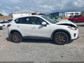 2016 Mazda CX-5 — photo 13 of 16 | VIN JM3KE2BY0G0704483