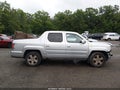 2011 Honda Ridgeline — photo 14 of 17 | VIN 5FPYK1F58BB011538