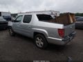 2011 Honda Ridgeline — photo 3 of 17 | VIN 5FPYK1F58BB011538
