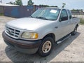 2002 Ford F-150 — photo 2 of 10 | VIN 1FTRX17232NB74487