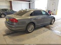 2016 Volkswagen Passat — photo 4 of 17 | VIN 1VWBS7A34GC040012