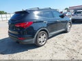 2013 Hyundai Santa Fe — photo 4 of 11 | VIN 5XYZUDLA7DG075754
