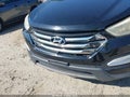 2013 Hyundai Santa Fe — photo 6 of 11 | VIN 5XYZUDLA7DG075754