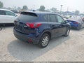 2014 Mazda CX-5 — photo 4 of 18 | VIN JM3KE4CY5E0343288