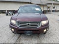 2013 Honda Ridgeline — photo 13 of 17 | VIN 5FPYK1F56DB010391