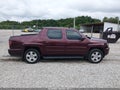 2013 Honda Ridgeline — photo 14 of 17 | VIN 5FPYK1F56DB010391