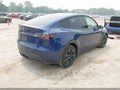 2024 Tesla Model Y — photo 4 of 18 | VIN 7SAYGAEE7RF111297