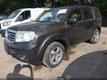 2013 Honda Pilot — photo 2 of 16 | VIN 5FNYF4H61DB067649