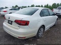 2016 Volkswagen Jetta — photo 4 of 12 | VIN 3VW267AJ5GM355094