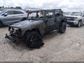 2015 Jeep Wrangler Unlimited — photo 2 of 10 | VIN 1C4BJWDG4FL668388