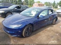 2024 Tesla Model 3 — photo 2 of 17 | VIN 5YJ3E1ET4RF871361