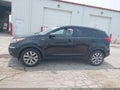 2016 Kia Sportage — photo 14 of 16 | VIN KNDPBCAC7G7873894