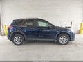 2015 Mazda CX-5 — photo 14 of 17 | VIN JM3KE4CY2F0476074