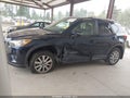 2015 Mazda CX-5 — photo 15 of 17 | VIN JM3KE4CY2F0476074