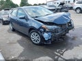 2018 Toyota Corolla — photo 1 of 16 | VIN 5YFBURHE5JP791103